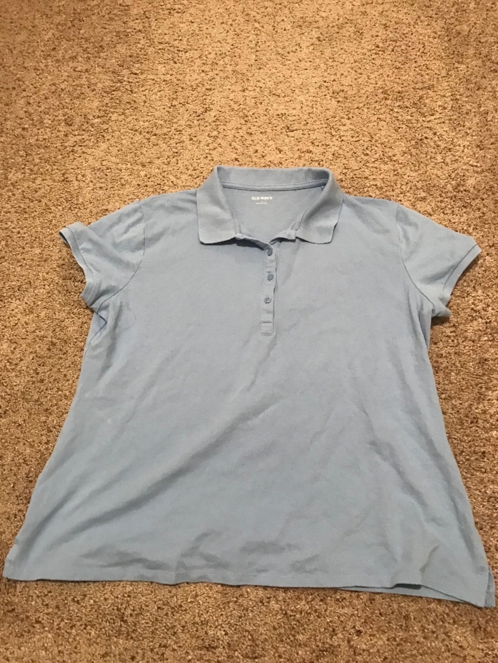 Light blue polo style shirt